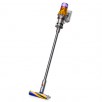 DYSON V12 Slim Detect Absolute belaidis dulkių siurblys - Sidabrinis korpusas su aukso spalvos akcentais aplink variklį ir violetiniu dangteliu viršutinėje dalyje – modernus ir elegantiškas dizainas.