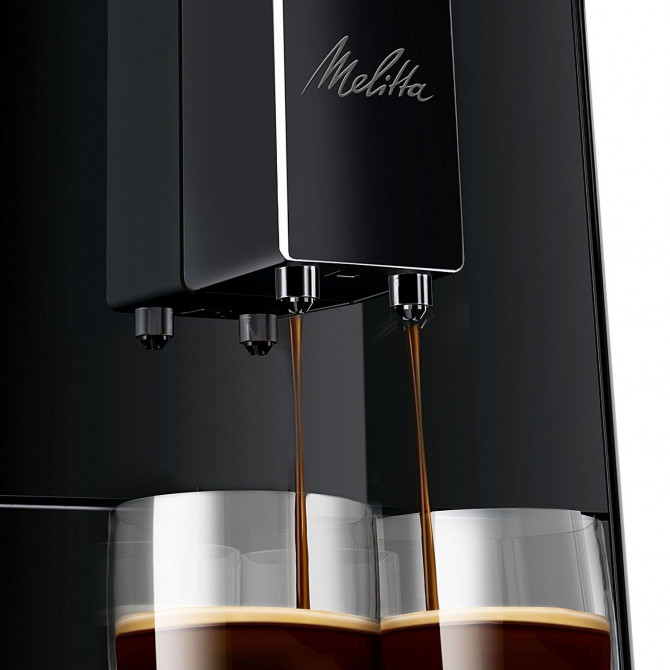 MELITTA SOLO automatinis kavos aparatas, juodos spalvos, galingas, kompaktiškas yra reguliuojamo aukščio kavos kranelis